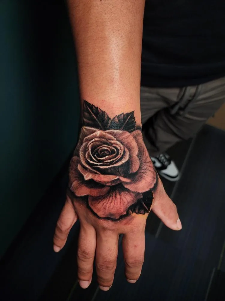 Cover image for "Hand Tattoos: Pros, Cons, and Considerations for First-Time Tattoo Seekers"
